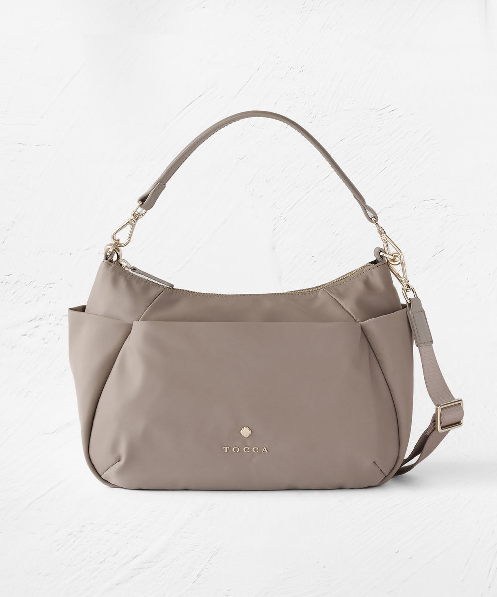 大人百花掲載】PIECE OF CRESCENT NYLONBAG – TOCCA OFFICIAL SITE 大人百花掲載】PIECE OF CRESCENT NYLONBAG – TOCCA OFFICIAL SITE